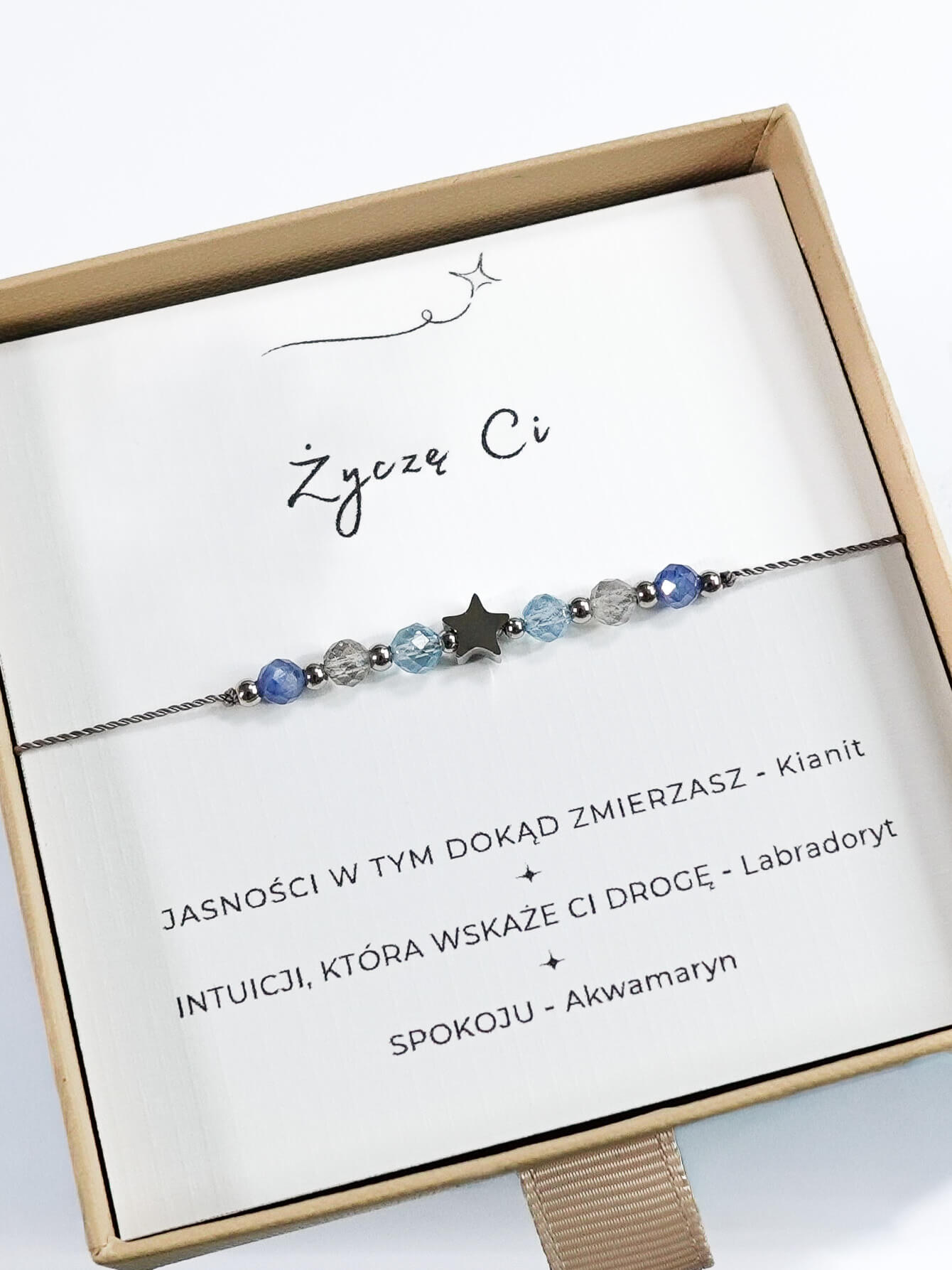 Bransoletka "Życzę Ci" z akwamarynem i gwiazdką.