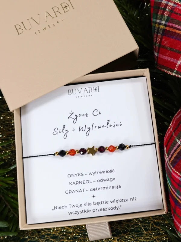 Bransoletka życzę ci siły z onyksem, karneolem, granatem i złotą gwiazdką, na sznurku, w pudełku prezentowym.